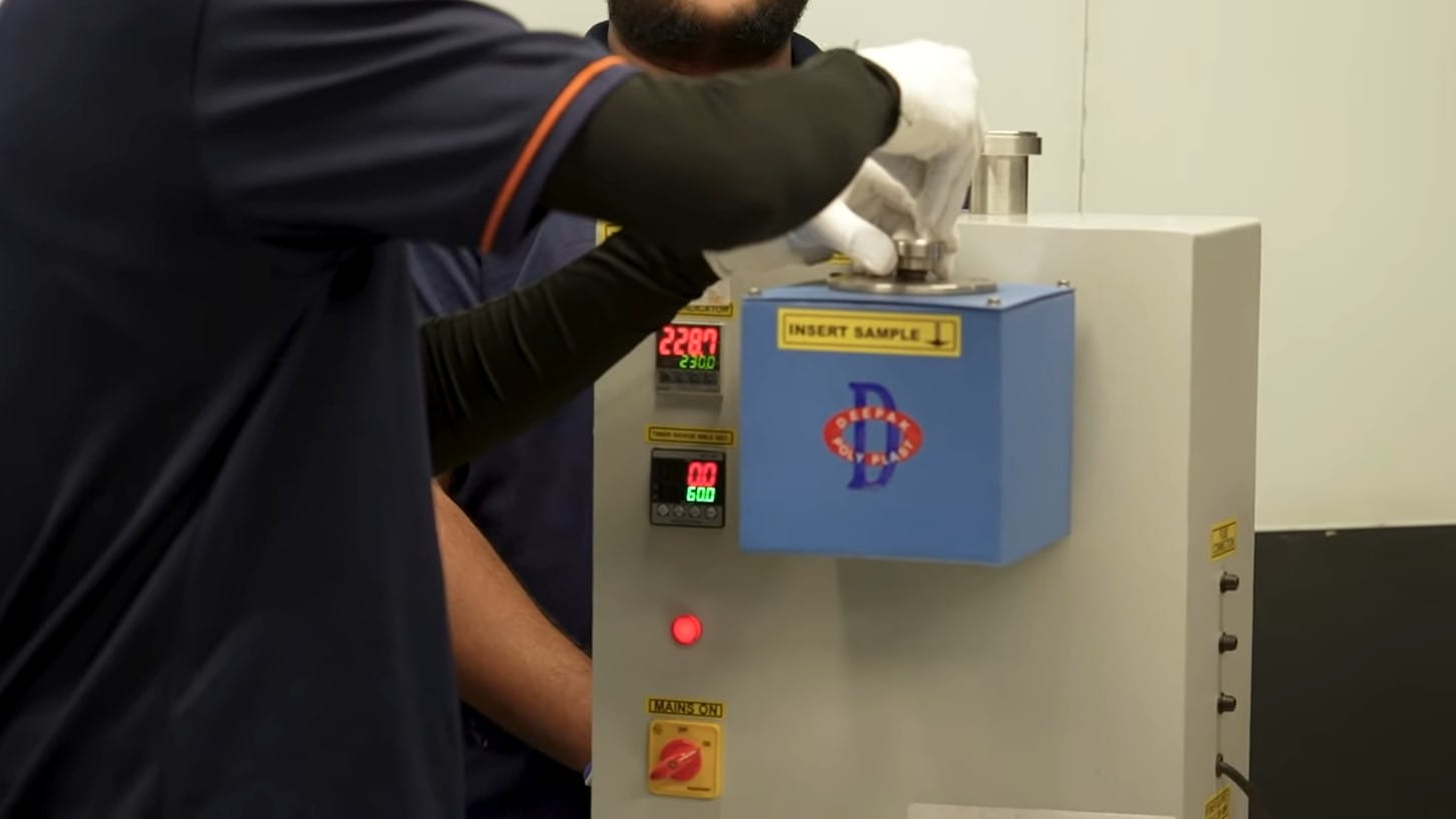 Insert the Sample for Melt Flow Testing