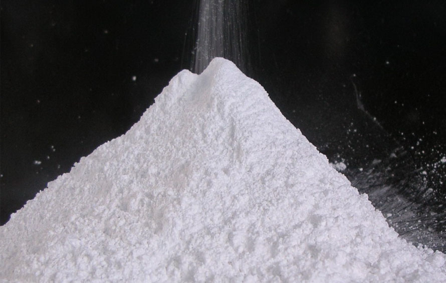 Talc is a naturally occurring mineral formed through the metamorphism of magnesium-rich rocks