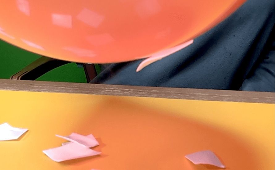 To test for static electricity on plastic, rub a charged object like a balloon against fabric and bring it close to the surface; attraction indicates static presence