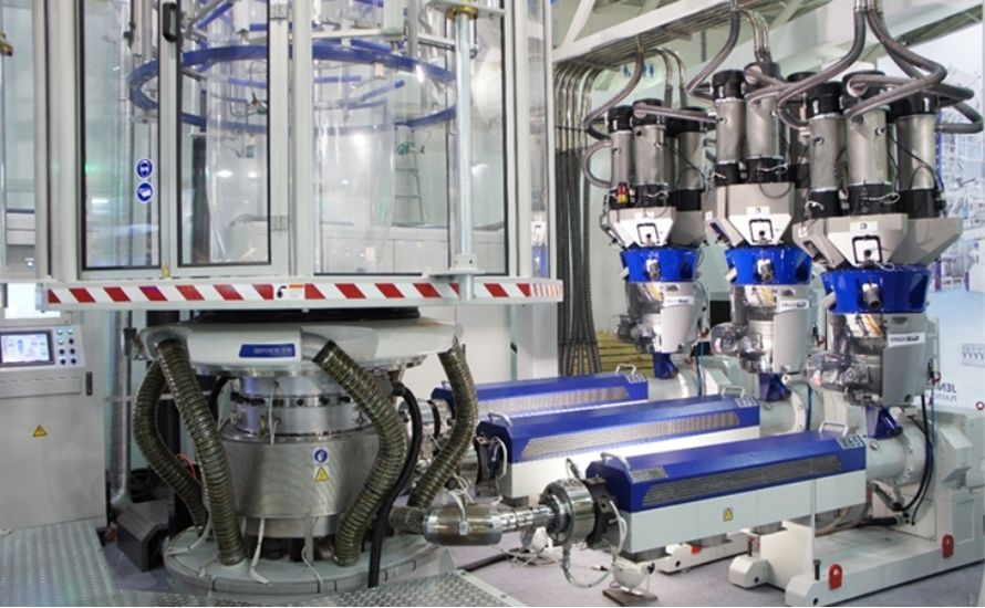 The disadvantages of blown film extrusion include the need for vacuum systems to prevent air entrapment, which increases complexity and production costs