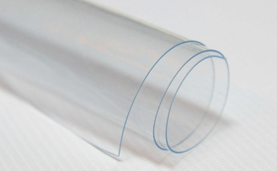 Plasticized PVC film is a soft, flexible material ideal for inflatable products, protective coverings, and flexible hoses.
