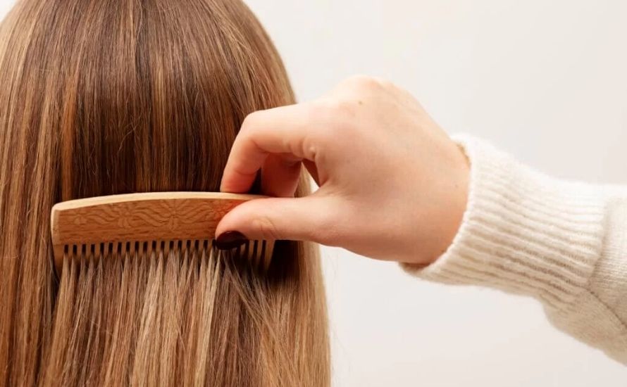 When you rub a plastic comb through your hair, electrons move from your hair to the comb, making your hair positively charged and the comb negatively charged